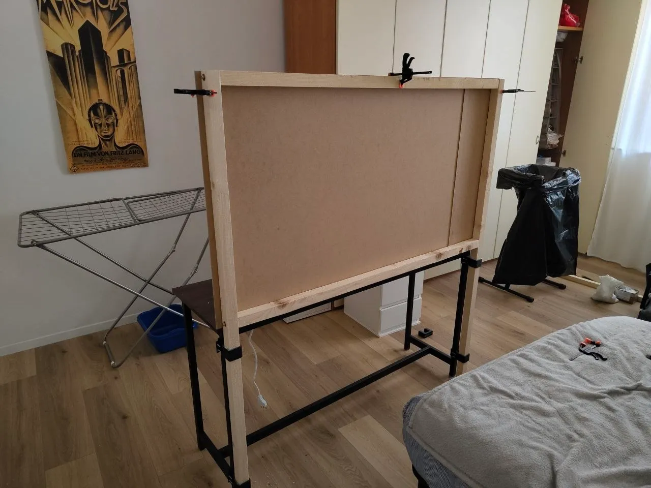 The panel starts to take shape. Initially the vertical board was clamped for boring mounting holes.